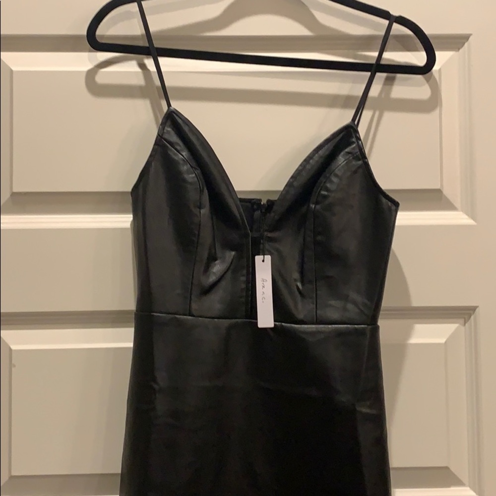 NEW Faux leather mini dress deep V neckline 🔥